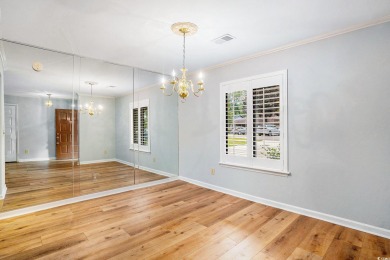Nestled on a spacious double lot in the popular 55+ Myrtle Trace on Burning Ridge Golf Course in South Carolina - for sale on GolfHomes.com, golf home, golf lot