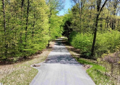Golf course and wooded homesites are available at The Ridges at on Manitou Passage Golf Club in Michigan - for sale on GolfHomes.com, golf home, golf lot
