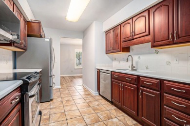 Nestled on a spacious double lot in the popular 55+ Myrtle Trace on Burning Ridge Golf Course in South Carolina - for sale on GolfHomes.com, golf home, golf lot