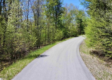 Golf course and wooded homesites are available at The Ridges at on Manitou Passage Golf Club in Michigan - for sale on GolfHomes.com, golf home, golf lot