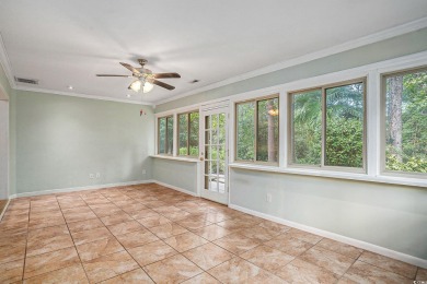 Nestled on a spacious double lot in the popular 55+ Myrtle Trace on Burning Ridge Golf Course in South Carolina - for sale on GolfHomes.com, golf home, golf lot