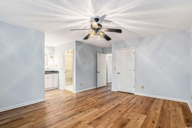 Nestled on a spacious double lot in the popular 55+ Myrtle Trace on Burning Ridge Golf Course in South Carolina - for sale on GolfHomes.com, golf home, golf lot