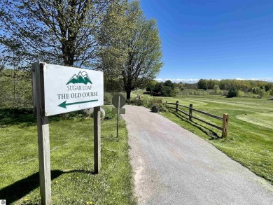 Golf course and wooded homesites are available at The Ridges at on Manitou Passage Golf Club in Michigan - for sale on GolfHomes.com, golf home, golf lot