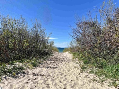 Golf course and wooded homesites are available at The Ridges at on Manitou Passage Golf Club in Michigan - for sale on GolfHomes.com, golf home, golf lot