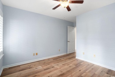 Nestled on a spacious double lot in the popular 55+ Myrtle Trace on Burning Ridge Golf Course in South Carolina - for sale on GolfHomes.com, golf home, golf lot