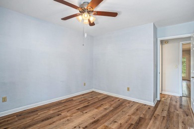 Nestled on a spacious double lot in the popular 55+ Myrtle Trace on Burning Ridge Golf Course in South Carolina - for sale on GolfHomes.com, golf home, golf lot