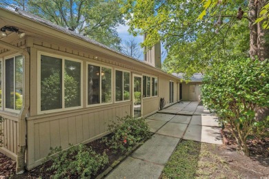 Nestled on a spacious double lot in the popular 55+ Myrtle Trace on Burning Ridge Golf Course in South Carolina - for sale on GolfHomes.com, golf home, golf lot