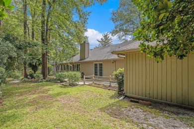 Nestled on a spacious double lot in the popular 55+ Myrtle Trace on Burning Ridge Golf Course in South Carolina - for sale on GolfHomes.com, golf home, golf lot