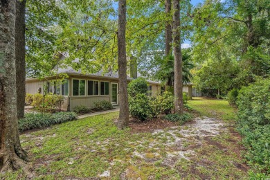 Nestled on a spacious double lot in the popular 55+ Myrtle Trace on Burning Ridge Golf Course in South Carolina - for sale on GolfHomes.com, golf home, golf lot