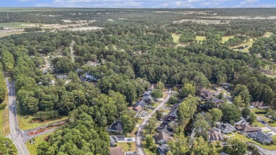 Nestled on a spacious double lot in the popular 55+ Myrtle Trace on Burning Ridge Golf Course in South Carolina - for sale on GolfHomes.com, golf home, golf lot