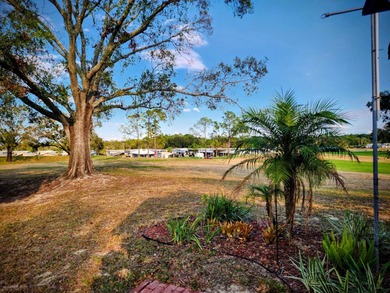 This tidy RV lot is perfect for the full time RVer or the on Deer Creek RV Golf Resort in Florida - for sale on GolfHomes.com, golf home, golf lot