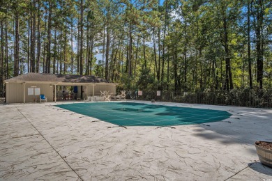 Nestled on a spacious double lot in the popular 55+ Myrtle Trace on Burning Ridge Golf Course in South Carolina - for sale on GolfHomes.com, golf home, golf lot