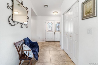 DARLING HOME WITH 3 BEDROOMS, 2 BATHROOMS, PLUS LARGE BONUS ROOM on Desert Lakes Golf Course in Arizona - for sale on GolfHomes.com, golf home, golf lot