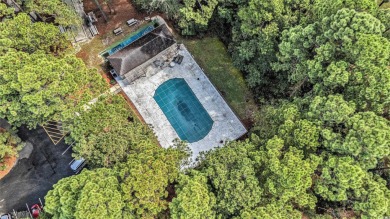 Nestled on a spacious double lot in the popular 55+ Myrtle Trace on Burning Ridge Golf Course in South Carolina - for sale on GolfHomes.com, golf home, golf lot
