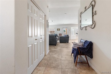 DARLING HOME WITH 3 BEDROOMS, 2 BATHROOMS, PLUS LARGE BONUS ROOM on Desert Lakes Golf Course in Arizona - for sale on GolfHomes.com, golf home, golf lot