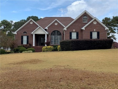 Beautiful four-sided brick ranch in sought after Lake Dow North on Canongate At Georgia National Golf Club in Georgia - for sale on GolfHomes.com, golf home, golf lot