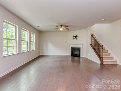 Welcome home to Killian Creek! Large, rocking chair, covered on Verdict Ridge Golf and Country Club in North Carolina - for sale on GolfHomes.com, golf home, golf lot