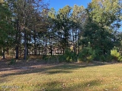Partially wooded lot in prestigious gated community of Albemarle on Sound Golf Links at Albemarle Plantation in North Carolina - for sale on GolfHomes.com, golf home, golf lot