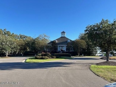 Partially wooded lot in prestigious gated community of Albemarle on Sound Golf Links at Albemarle Plantation in North Carolina - for sale on GolfHomes.com, golf home, golf lot
