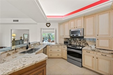 This beautifully renovated and sun-drenched 2-bedroom + den, 2 on Club at Pelican Bay Golf Course in Florida - for sale on GolfHomes.com, golf home, golf lot