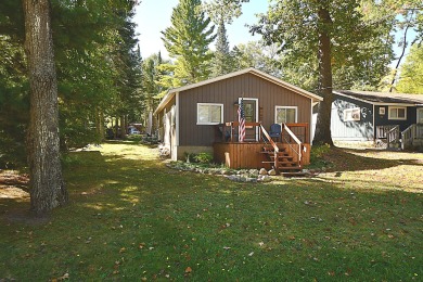 Enjoy up north living at its best in this highly sought after on Birch Pointe Golf Club in Michigan - for sale on GolfHomes.com, golf home, golf lot
