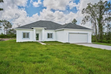 Beautiful new construction in Indian Lake Estates! A golf and on Indian Lake Estates Golf and Country Club in Florida - for sale on GolfHomes.com, golf home, golf lot