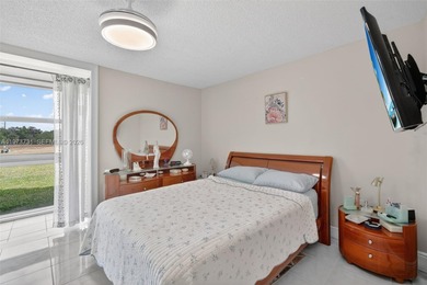 Beautifully updated 1-bedroom, 1-bath residence located in a on Sunrise Lakes Phase III in Florida - for sale on GolfHomes.com, golf home, golf lot