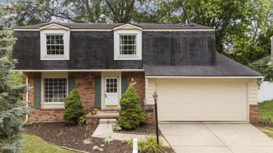 Welcome to this lovely colonial in the Fairway Hills on Polo Fields Washtenaw Country Club in Michigan - for sale on GolfHomes.com, golf home, golf lot