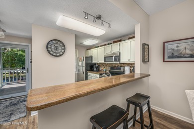 Oh, my, my, what a view and a calming water feature from the on Tidewater Golf Club and Plantation in South Carolina - for sale on GolfHomes.com, golf home, golf lot