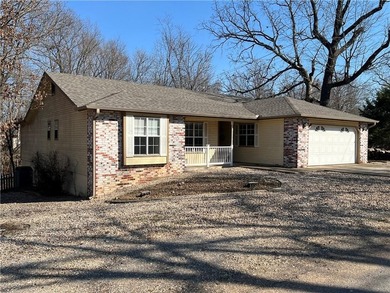 Outstanding price and location, new roof and gutters, very well on Bella Vista Country Club and Golf Course in Arkansas - for sale on GolfHomes.com, golf home, golf lot