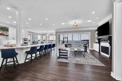 Experience elevated lake living at 244 Compass Point where on The Patriot Golf Club At Grand Harbor in South Carolina - for sale on GolfHomes.com, golf home, golf lot