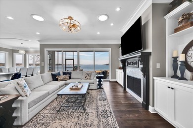 Experience elevated lake living at 244 Compass Point where on The Patriot Golf Club At Grand Harbor in South Carolina - for sale on GolfHomes.com, golf home, golf lot