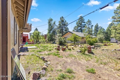 Wow! This 5 bedroom or 4+ game room sleeps 12-15 and is located on Pinewood Country Club in Arizona - for sale on GolfHomes.com, golf home, golf lot