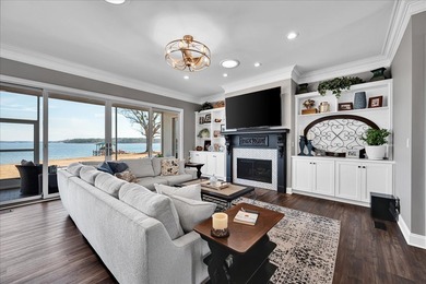 Experience elevated lake living at 244 Compass Point where on The Patriot Golf Club At Grand Harbor in South Carolina - for sale on GolfHomes.com, golf home, golf lot