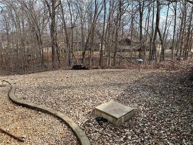 Outstanding price and location, new roof and gutters, very well on Bella Vista Country Club and Golf Course in Arkansas - for sale on GolfHomes.com, golf home, golf lot