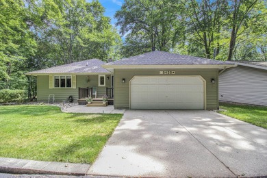 Welcome to this charming ranch-style home overlooking the 4th on Canadian Lakes Country Club-The Highlands Course in Michigan - for sale on GolfHomes.com, golf home, golf lot