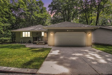Welcome to this charming ranch-style home overlooking the 4th on Canadian Lakes Country Club-The Highlands Course in Michigan - for sale on GolfHomes.com, golf home, golf lot