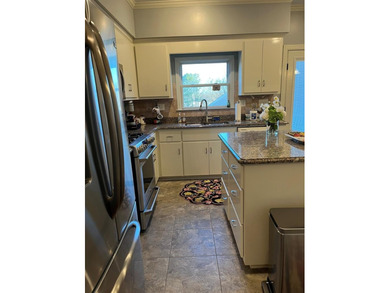 A lovely French inspired home overlooking the new Olde Eight on The Links At Stoney Point in South Carolina - for sale on GolfHomes.com, golf home, golf lot