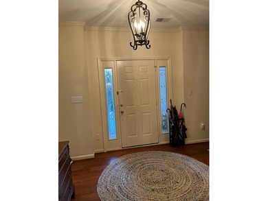 A lovely French inspired home overlooking the new Olde Eight on The Links At Stoney Point in South Carolina - for sale on GolfHomes.com, golf home, golf lot