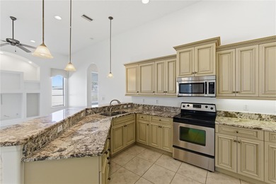 Stunning Custom Pool Home in Desirable Pine Lakes! Welcome to on The Grand Club - Pine Lakes Course in Florida - for sale on GolfHomes.com, golf home, golf lot