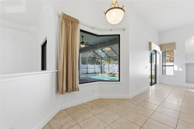 Stunning Custom Pool Home in Desirable Pine Lakes! Welcome to on The Grand Club - Pine Lakes Course in Florida - for sale on GolfHomes.com, golf home, golf lot