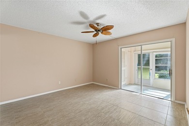 Desirable first floor 2-bedroom, 2-bath in an active 55+ on The American Golf Club in Florida - for sale on GolfHomes.com, golf home, golf lot