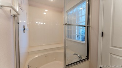 Wow! What a View! Ride the elevator to a SUPER CLEAN lakefront on Tan-Tar-A Golf Club in Missouri - for sale on GolfHomes.com, golf home, golf lot