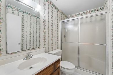 Desirable first floor 2-bedroom, 2-bath in an active 55+ on The American Golf Club in Florida - for sale on GolfHomes.com, golf home, golf lot