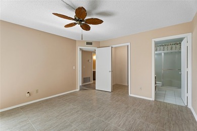 Desirable first floor 2-bedroom, 2-bath in an active 55+ on The American Golf Club in Florida - for sale on GolfHomes.com, golf home, golf lot