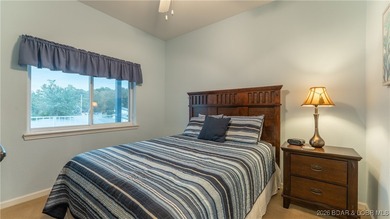 Wow! What a View! Ride the elevator to a SUPER CLEAN lakefront on Tan-Tar-A Golf Club in Missouri - for sale on GolfHomes.com, golf home, golf lot