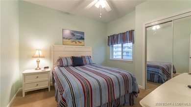 Wow! What a View! Ride the elevator to a SUPER CLEAN lakefront on Tan-Tar-A Golf Club in Missouri - for sale on GolfHomes.com, golf home, golf lot