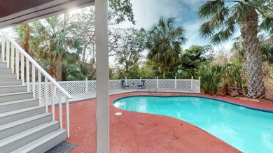 One or more photo(s) has been virtually staged. HIGH AND DRY on Seminole Lake Country Club in Florida - for sale on GolfHomes.com, golf home, golf lot