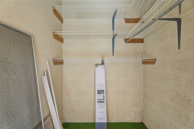 Desirable first floor 2-bedroom, 2-bath in an active 55+ on The American Golf Club in Florida - for sale on GolfHomes.com, golf home, golf lot