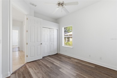 Stunning Custom Pool Home in Desirable Pine Lakes! Welcome to on The Grand Club - Pine Lakes Course in Florida - for sale on GolfHomes.com, golf home, golf lot